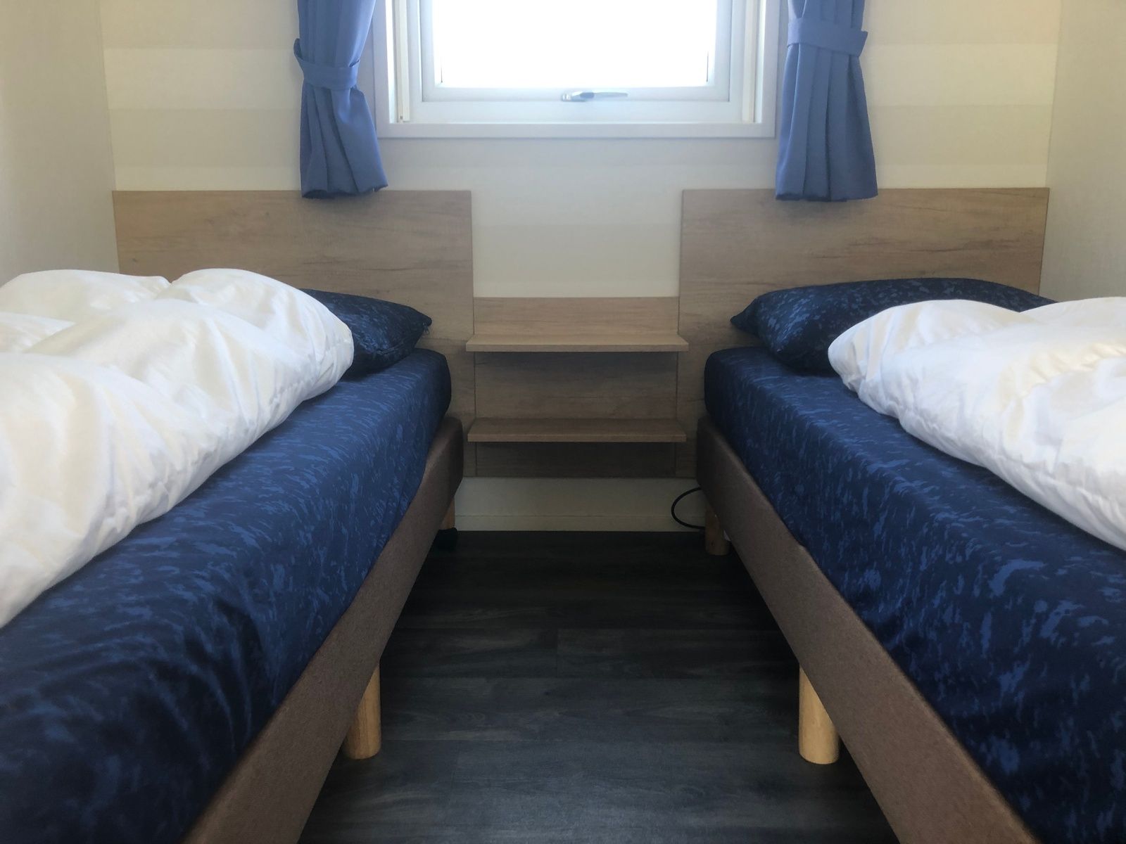Double bedroom with natural light in Vakantiepark de Bremakker, Texel.