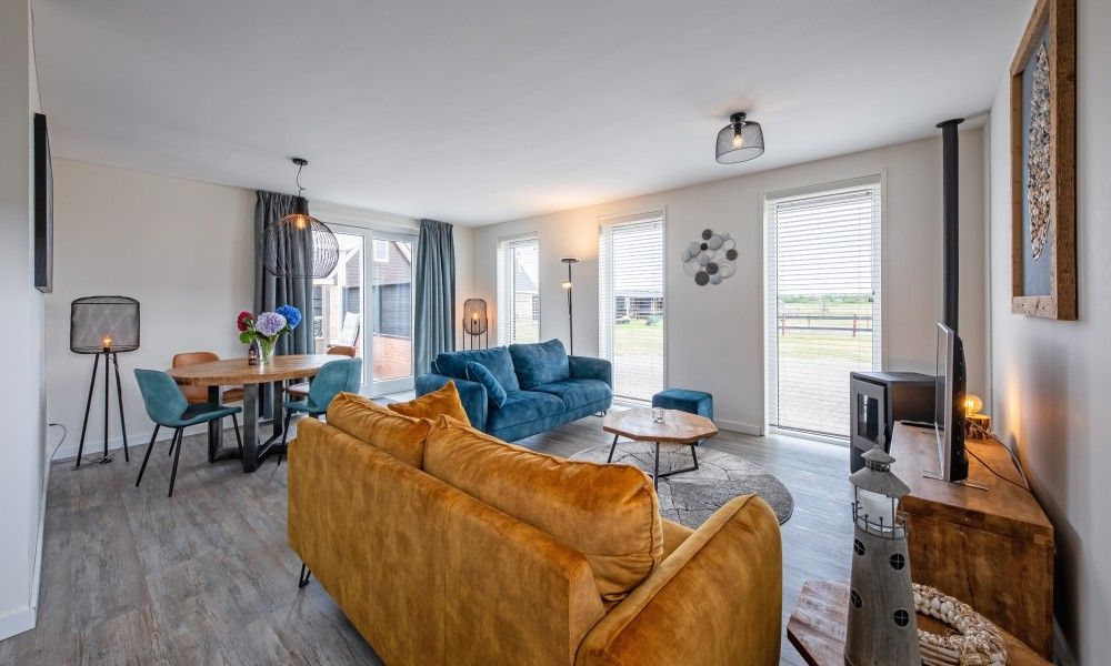 Gemuetliches Wohnzimmer in Wulpenweid 10 de Wulp, Ferienhaus De Dennen Texel mit viel Licht.