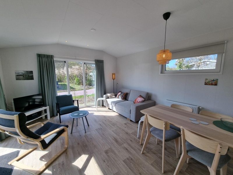 Gemuetliches Wohnzimmer im Vakantiepark de Bremakker - Bosveld 146, ein ideales Ferienhaus in De Dennen, Texel.