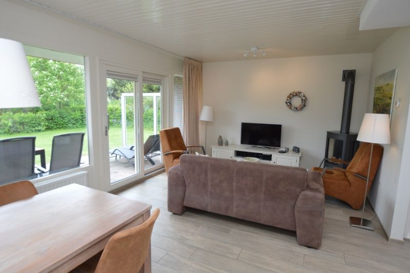 Gemuetliches Wohnzimmer des Ferienhauses Tempelierweg - Kogermient 11 in De Dennen, Texel.