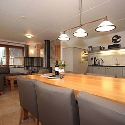 Cozy dining room in 6 pers. luxury wheelchair friendly villa, De Cocksdorp, Texel with modern kitchen.