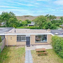 Exterior of Bungalow Duin aan Zee Texel in Bungalowpark Tamarisk, surrounded by nature in De Cocksdorp, Wadden Islands.