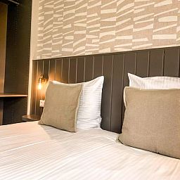 Gemuetliches Schlafzimmer mit Nachtbeleuchtung im Ferienhaus Hogezandskil, De Cocksdorp, Texel fuer einen entspannten Aufenthalt.