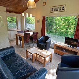 Offener Wohnbereich im Ferienhaus Slufterduin 128, De Cocksdorp, Texel mit bequemen Sitzgelegenheiten.