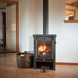 Stimmungsvoller Kaminofen im Ferienhaus De Velduil De Cocksdorp Texel