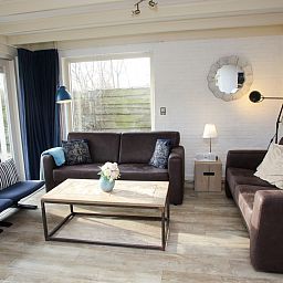 Gemuetliches Wohnzimmer des Ferienhauses Blom & Co, De Cocksdorp, Texel.