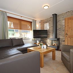 Gemuetliches Wohnzimmer im Wintergarten der Villa De Witte Hoek, Ferienhaus in De Cocksdorp, Texel.