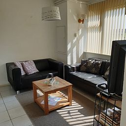 Comfortable sitting area in the cottage of Family Bouthoorn in Zuid-Eierland, Texel.