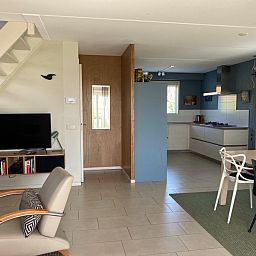 Modern kitchen and dining area in Frederik and Lodevika vacation home, De Cocksdorp, Texel.