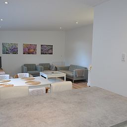 Cozy living room in Boodtlaan 7 / Dennenheuvel vacation home, De Koog, Texel, with comfortable seating area.