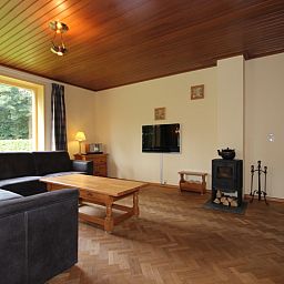Cozy living room of Landhuis Landleven No. 81, vacation home in De Koog, Texel with comfortable interior.