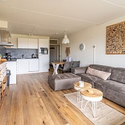 Open kitchen and living room in Apartment Juliana 086, De Koog, Texel, ideal for vacations.