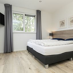 Comfortable bedroom in Villa 21A, De Koog, Texel, perfect vacation home on the Wadden Islands.