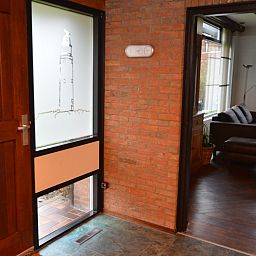 Entrance to vacation home Orchismient 28 De Koog Texel with atmospheric entry.