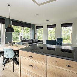Open kitchen and living space in Villa 37, De Koog, Texel. Cozy vacation home on the Wadden Islands.