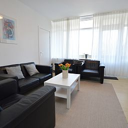 Modern living space in Apartment Kerckeland 98, De Koog, Texel with comfortable furniture and natural light.