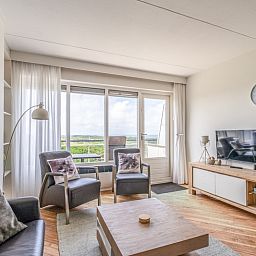 Gemuetliche Sitzecke im Appartement Juliana 146 Island and Sea View, Texel, mit herrlicher Aussicht.