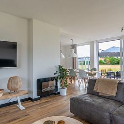 Modern living room in Cottage in De Koog overlooking terrace, Texel, Wadden Islands.