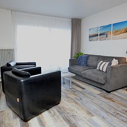 Bright living room in Motel Texel - Apartment 211/1P, De Koog, Texel, with stylish furnishings.