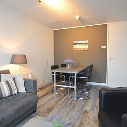 Dining area in Motel Texel - Apartment 211/1P, De Koog, Texel, with spacious dining table.