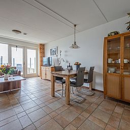 Dining area overlooking the sea in Resort De Buteriggel Apartment 1, De Koog, Texel.