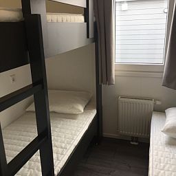 Cozy children's room with bunk beds in Chalet Bregkoog 224, De Koog, Texel.