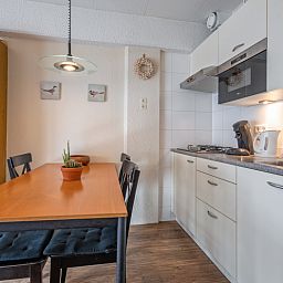 Practical kitchen and dining area in Motel Texel Apartment with Bath (B), De Koog, Texel for cozy meals.