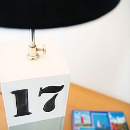 Stylish lamp in Villa 6, vacation home in De Koog Texel, atmospheric details on the Wadden Islands.