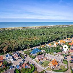 Aerial view of De Koog, Texel with The Strandvondst vacation home near the shore.