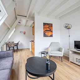 Stylish interior of Two persons apartment large - second floor, De Koog, Texel with comfortable furniture.