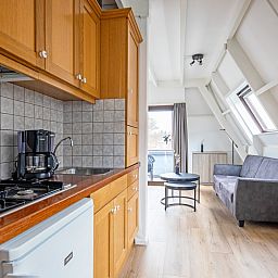 Fully equipped kitchen in Two persons apartment large - second floor, De Koog, Texel with modern amenities.