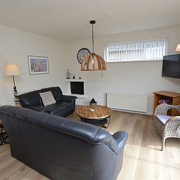 Stylish interior of Holiday home Stappeland 205 in De Koog, Texel with modern furniture and lots of natural light.