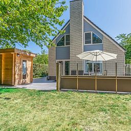 Enjoy the outdoor space of Holiday home Kamperfoelie 43 with sauna, located in green De Koog on Texel.