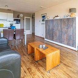 Spacious living room with dining area in Apartment Juliana 168 Zeezicht, De Koog Texel, ideal for relaxation.