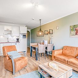 Open kitchen and dining area in Apartment Juliana 136 Island and Sea View, De Koog, Texel.