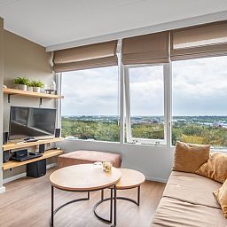 Light seating area with comfortable sofa in Apartment Juliana 178 Eilandzicht, De Koog, Texel.