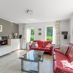Comfortabele zithoek in Vakantiehuis Kamperfoelie 77, De Koog, Texel