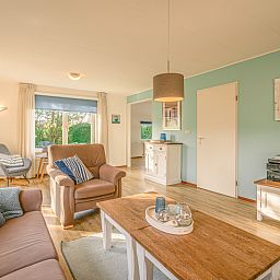 Spacious living space in Holiday home Honeysuckle 65, De Koog, Texel, with lots of natural light.