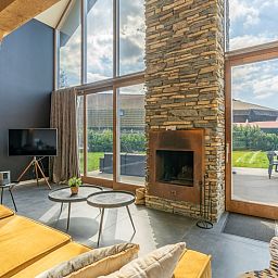 Gemuetliche Sitzecke mit Kamin in Villa 181 mit Whirlpool, De Koog Texel.