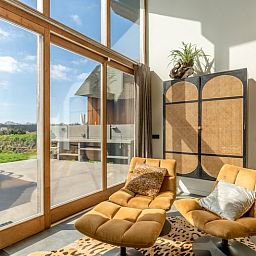 Bequeme Liegestuehle in der Villa 181 mit Whirlpool, De Koog Texel, mit Gartenblick.