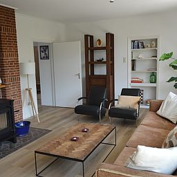 Cozy fireplace and stylish decor in Plevierstraat 24 - Tuunwoal vacation home, De Koog, Texel.