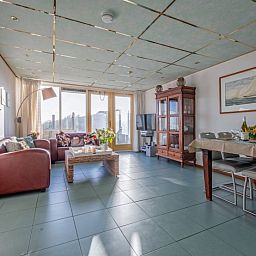 Spacious living space in Resort De Buteriggel - Apartment 9, De Koog, Texel with modern furnishings and lots of natural light.