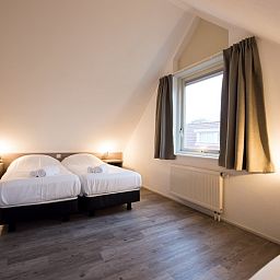 Geraeumiges Doppelzimmer in Villa 2, De Koog Texel, ideal fuer einen entspannten Urlaub.