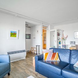 Spacious interior of Apartment Juliana 112 Zeezicht, De Koog, Texel with access to the kitchen and bedroom.