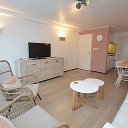 Bright and spacious living space in Apartments Anna - Sun, De Koog, Texel, with modern amenities and a cozy atmosphere.