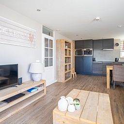 Modern kitchen and dining area in Apartment Juliana 034 Eilandzicht, De Koog, Texel for a relaxing stay.