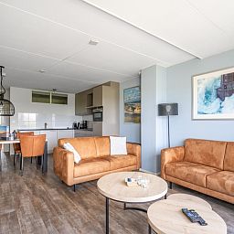 Offene Kueche und Wohnzimmer im Apartment Juliana 096 Eiland en Zeezicht, De Koog, Texel fuer einen gemuetlichen Urlaub.
