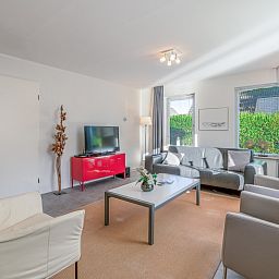 Cozy indoor area of Holiday home Honeysuckle 93 with sauna, De Koog, Texel, with modern furnishings.