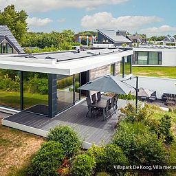 Terrace of the luxury family villa with pool in De Koog, Texel. Enjoy the view of the Wadden Islands.