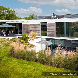 Luxury family villa with pool in De Koog, Texel. Spacious veranda for ultimate relaxation on the Wadden Islands.
